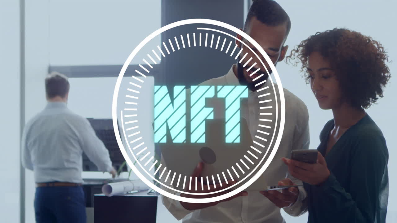 Man and woman reviewing tablet and smartphone in tech office, highlighting NFT graphic overlay