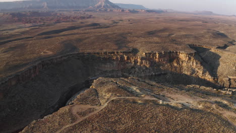 aerial view of winding red rock canyon in utah