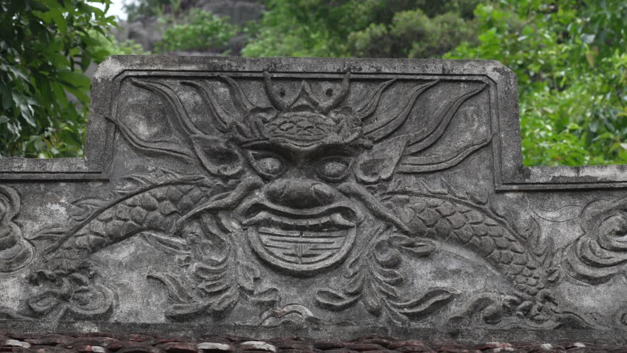 Detailed stone carving dragon mythical creature Bich Dong Pagoda Ninh Binh, Vietnam