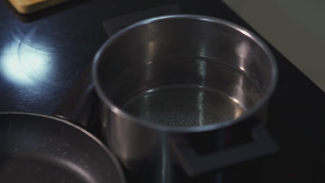 empty pot of water on stovetop