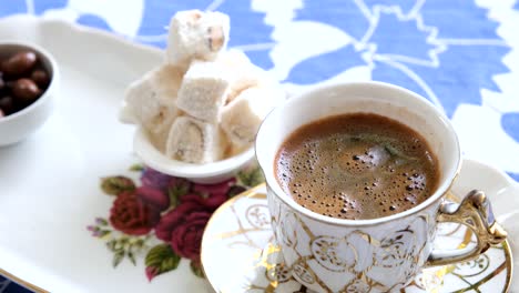 turkish delight and coffee served on the table