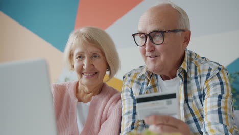 elderly couple shopping online