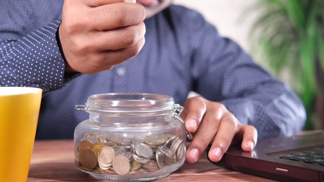 Saving Coins into a Glass Jar