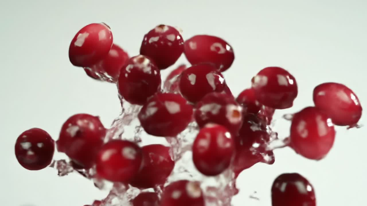 A Stunning Close-Up of Juicy Pomegranate Seeds Displaying Their Glossy Red Exterior, Capturing the Essence of Freshness and Nutrition