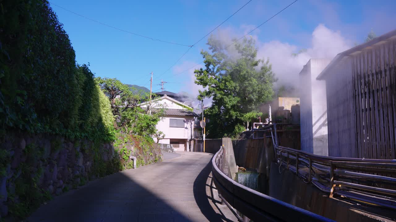 Steam Rising From Bathhouses in Beppu Neighborhood, Japan