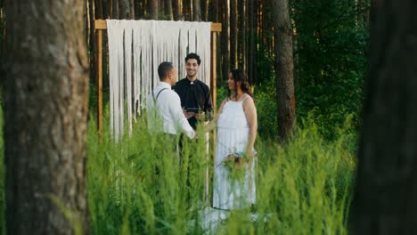 outdoor forest wedding ceremony
