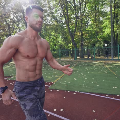 sport man running on racetrack
