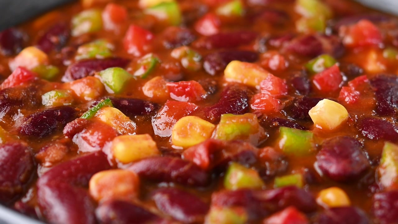 Feijões mexicanos com chilli e legumes