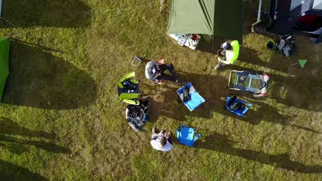 high Shot Spinning shot of Group of Campers on camp site