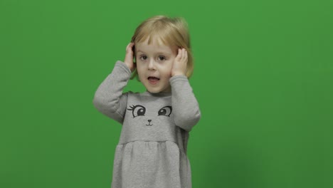 Kid-girl-on-a-Green-Screen,-Chroma-Key.-Happy-three-years-old-girl