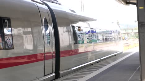 a sleek ice train starts at a german train station, symbolizing modern transportation, efficiency, and travel. ideal for projects related to urban mobility, infrastructure, and technology.