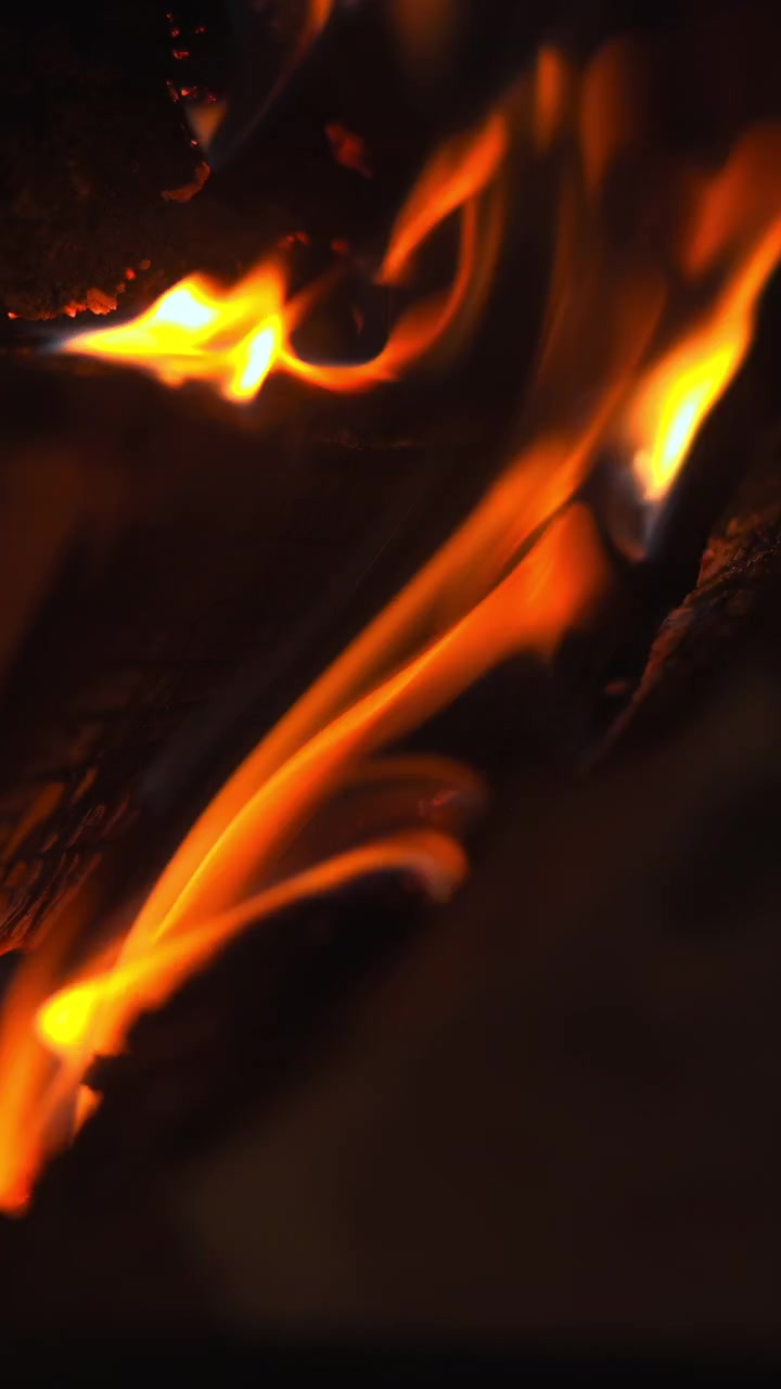 Flame Trail Sweeping Across Burning Log, Slender Orange Streaks And Curling Smoke, Dramatic Motion Closeup