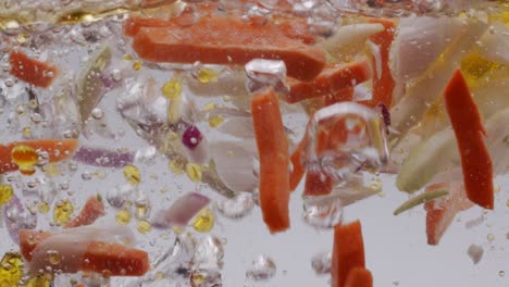 various chopped vegetables in boiling water