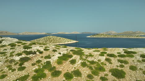 slow drone panning shot of luxurious sailing yacht moored in kornati national park