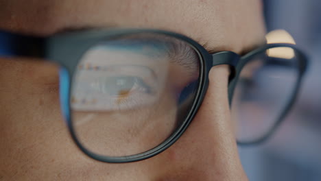 close-up of person wearing glasses