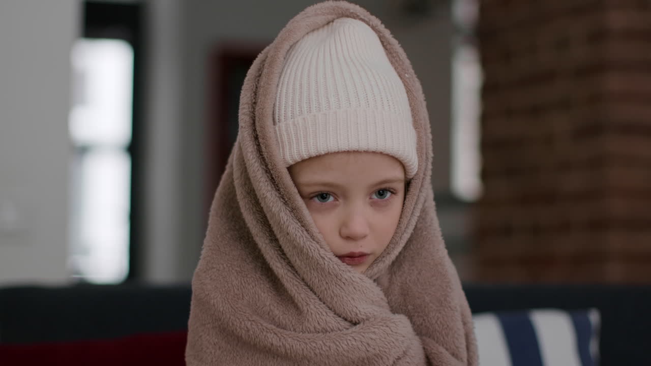 Sick Child Wrapped in a Blanket