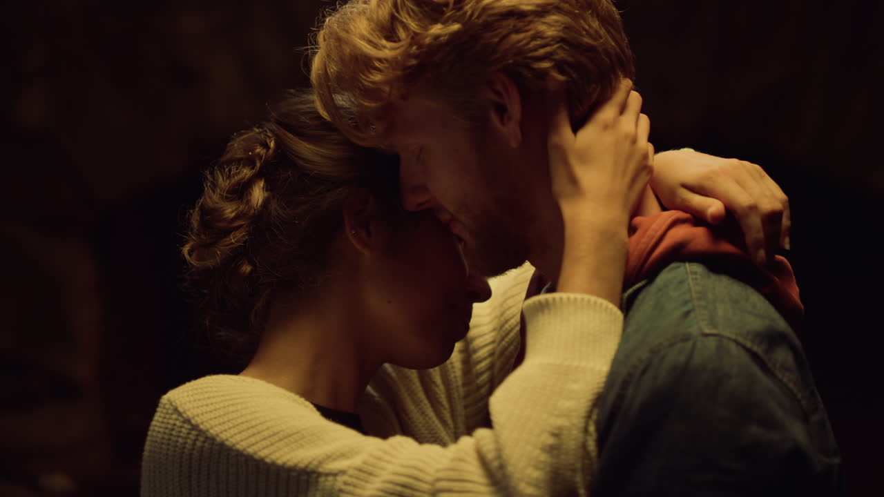 Closeup couple dancing slow on romantic evening. Lovely girlfriend boyfriend hug