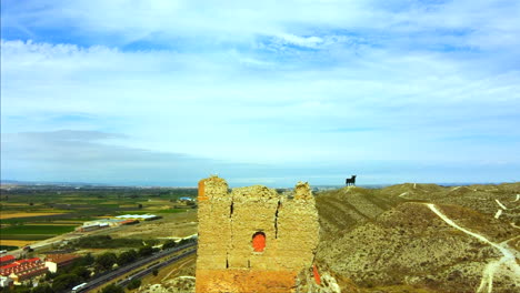 ruined castle with the osborne bull in the background