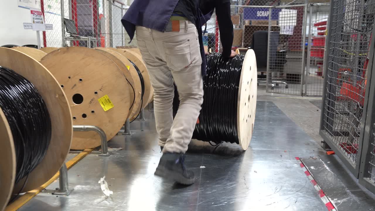 Pushing Cable Roll in Factory