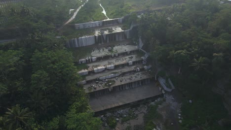 Unique-waterfall-at-Watu-Purbo,-Indonesia.-Aerial-orbit