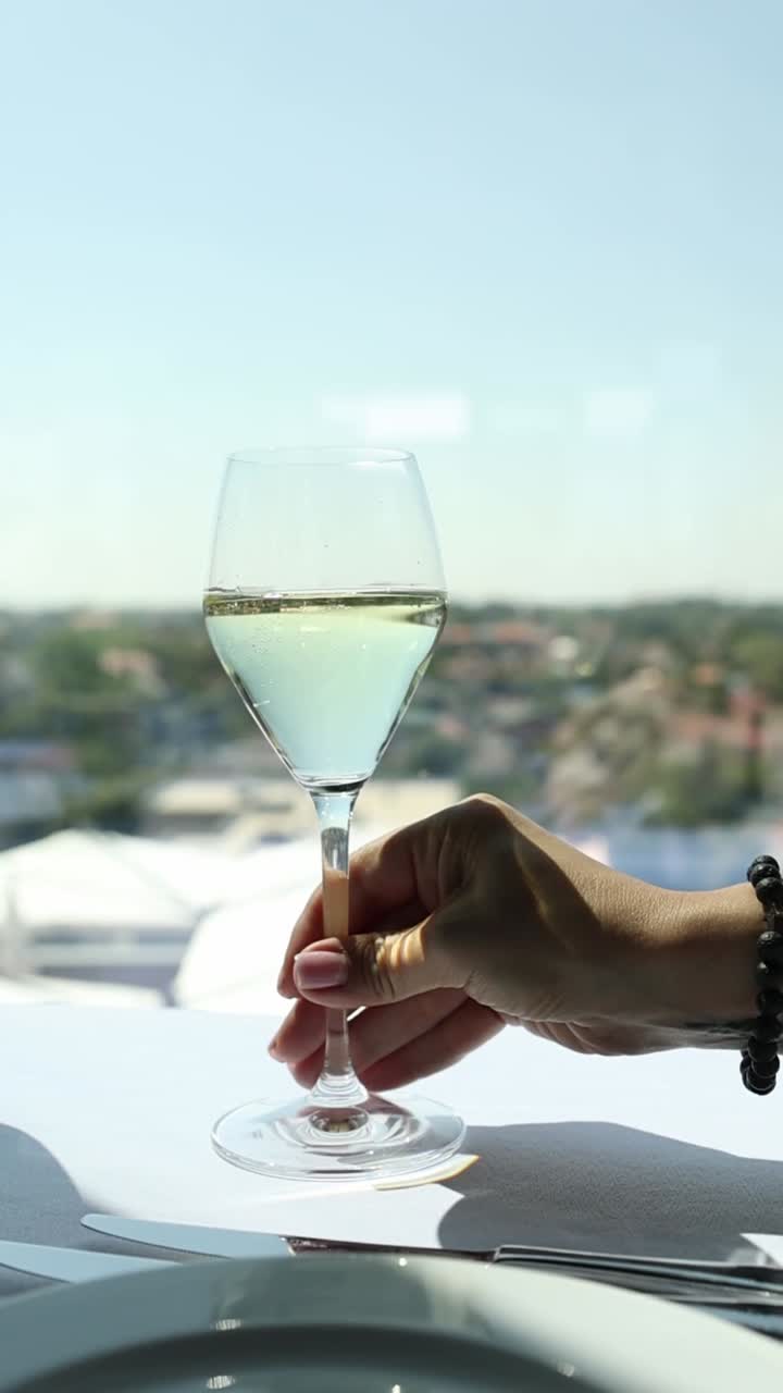 Wine glass with city view