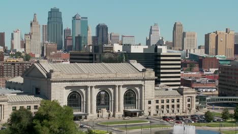 a daytime view of the kansas city missouri skyline including union station in foreground