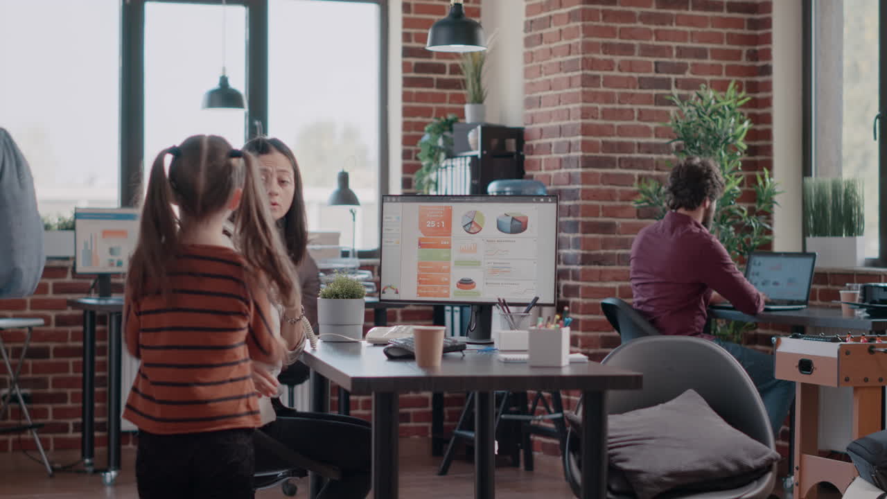 Child interfering with working mother, talking on landline phone call