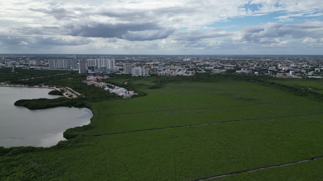 Dolly shot horizon flyover Nichupte mangrove lagoon in Cancun, Mexico