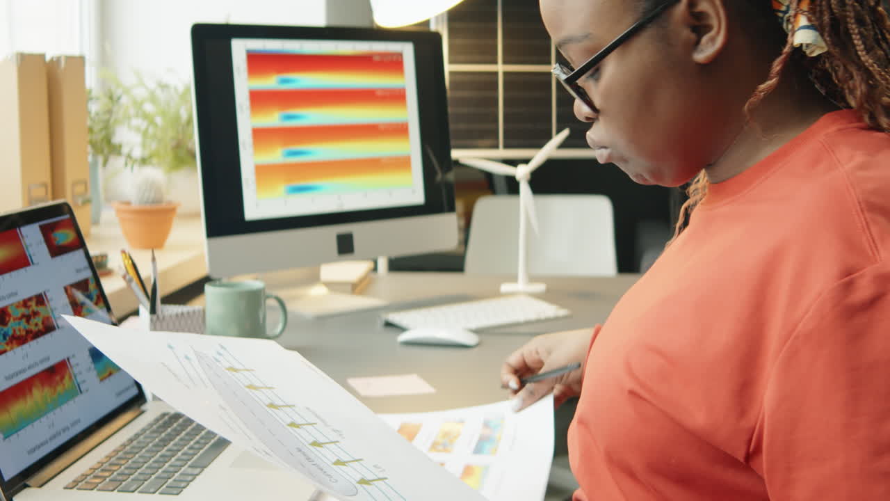 Female Engineer in Wheelchair Working on Sustainable Energy Project