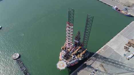 north sea oil rig platform at great yarmouth ,norfolk uk overhead aerial 4k footage point of view