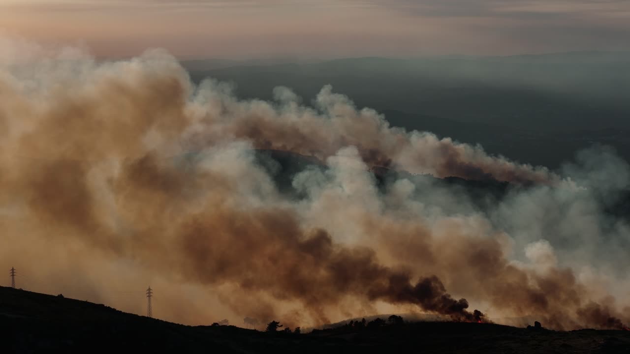 Smoke of wildlifire in Portugal at sunset 2
