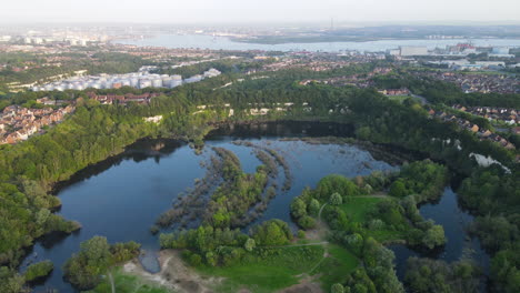 chafford gorges nature park surrounded by houses and industry