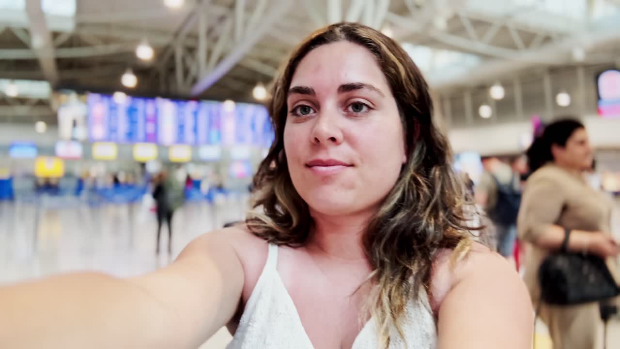 Young Woman Capturing Selfie on Airplane Before Departure