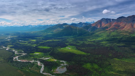 alaska's stunning landscapes. stunning views of alaska's vast mountains and rivers showcase the beauty of nature during a clear day in summer