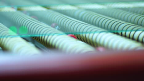 low angle view of pane of glass on rolling machine