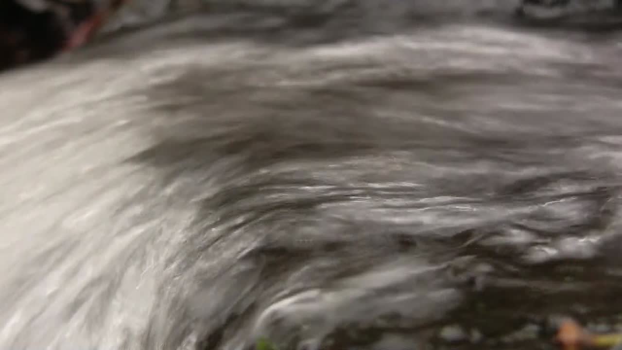 Close-up of a flowing stream over rocks