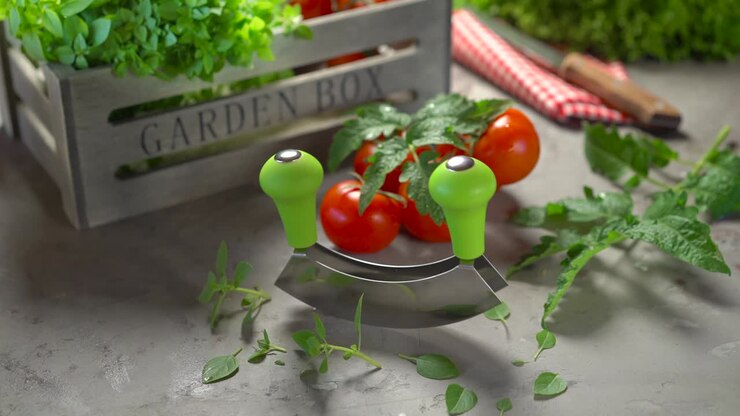 Cinemagraph fresh garden herbs and mezzaluna knife with wooden box