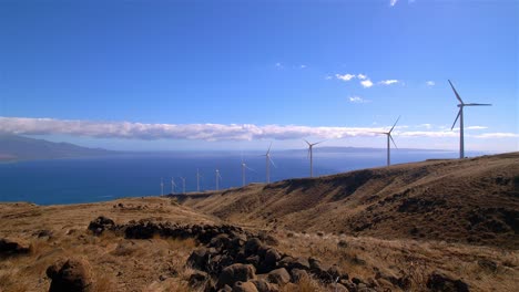 hawaii mountain top windmill overview ocean boat slow motion