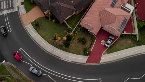 Aerial-shot-of-a-residential-area,-revealing-a-lake