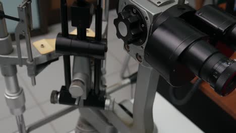 Biomicroscope or A slit lamp is a microscope with a bright light used during an eye exam