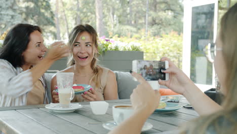 friends enjoying dessert and photos