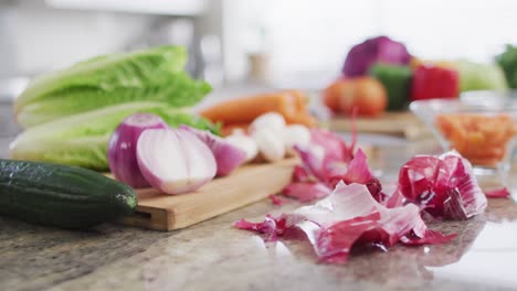 video of vegetables lying on cutting board prepared for cooking