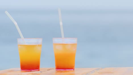 Two-Alcoholic-Cocktail-On-The-Background-Of-The-Sea