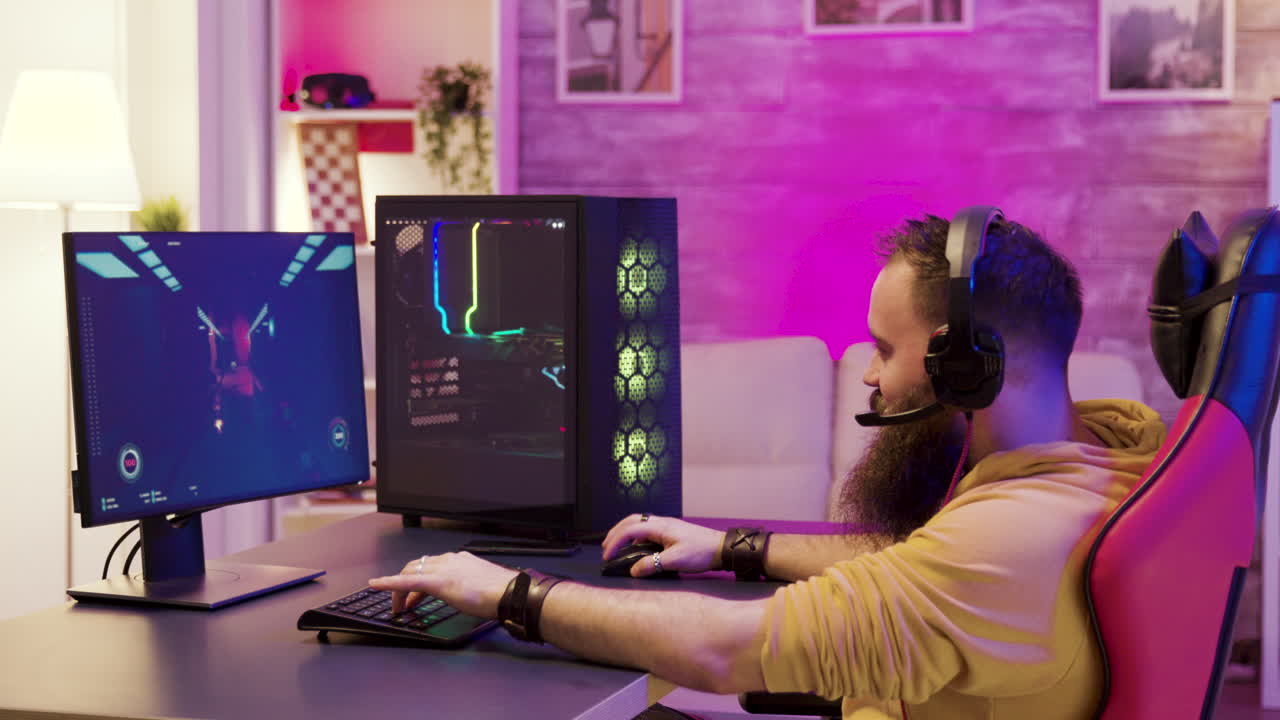 Man playing video game on PC