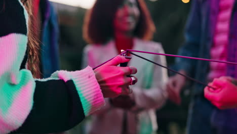 friends celebrating with sparklers