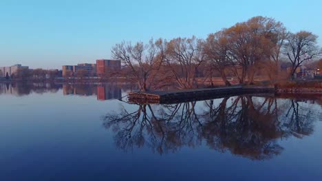 aerial peaceful sunrise over a lake