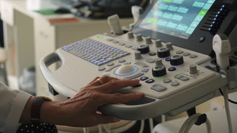 person operating an ultrasound machine