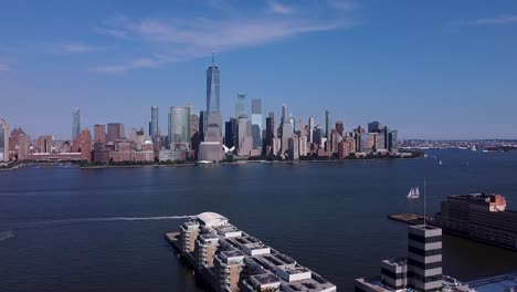 new york city skyline during the day with the hudson river