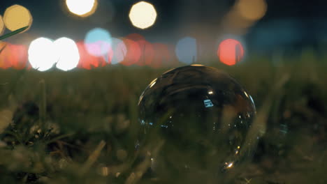 Traffic-and-glass-orb-at-the-roadside