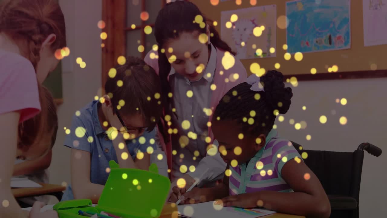 Teacher leaning over boy and girl in classroom guiding drawing with crayons green box